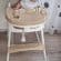 Scaun de masa bebe 4 in 1 little bird, Varsta 6-72 luni, Scaun inalt pliabil, cu 4 roti, Balansoar, 2 x Tava detasabila, Centura de siguranta in cinci puncte, Crem