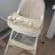 Scaun de masa bebe 4 in 1 little bird, Varsta 6-72 luni, Scaun inalt pliabil, cu 4 roti, Balansoar, 2 x Tava detasabila, Centura de siguranta in cinci puncte, Crem