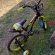 Bicicletă copii JRH Sport 16 inch, cu roți ajutătoare LED, cadru oțel, frână de mână, coș – Negru/verde