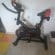 Bicicletă Fitness Staționară BUZ, 5 Trepte, Volantă 6kg, Greutate Suportată 110kg, Reglabilă – Negru/Roșu